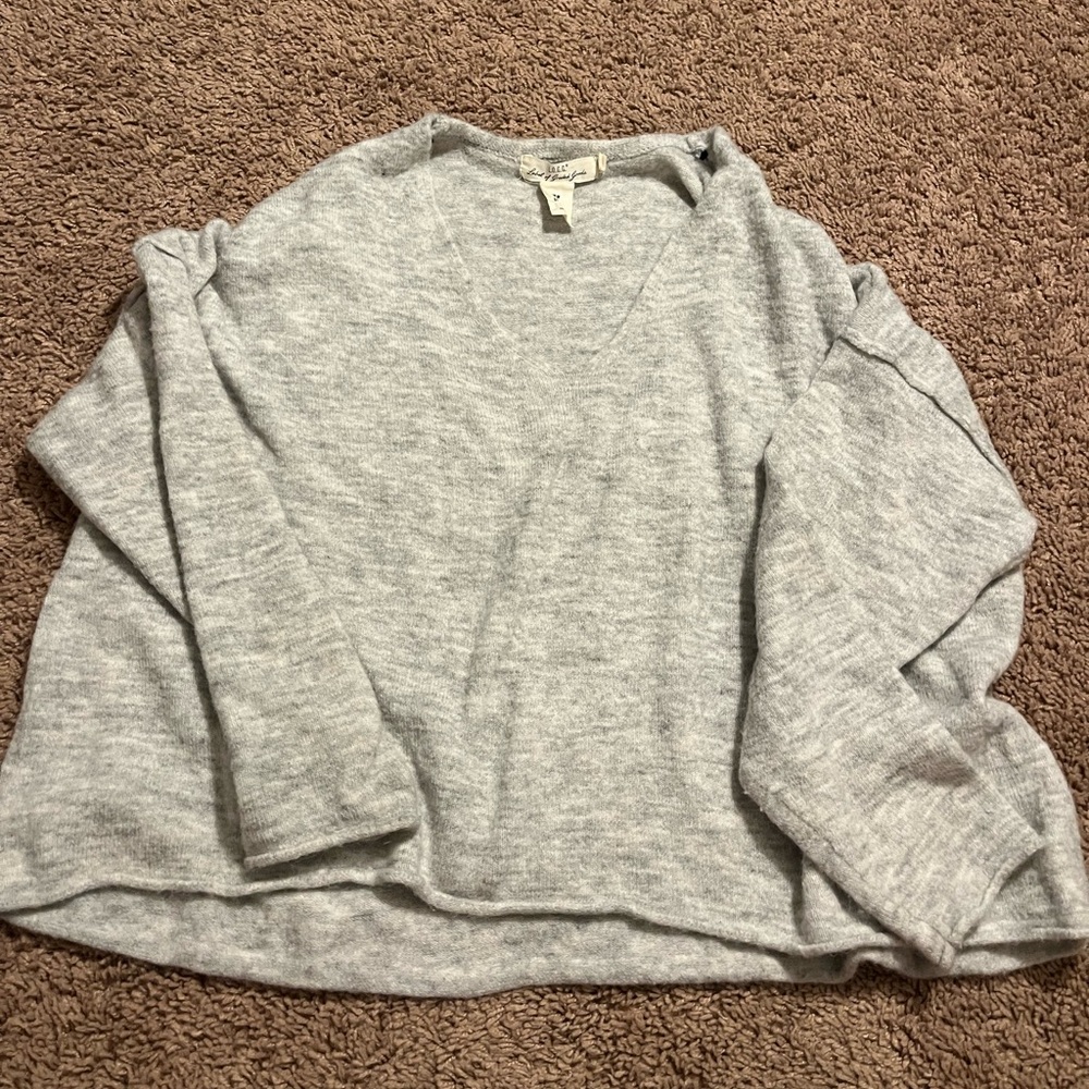 Oversized super comfy and v-neck or off the shoulder soft sweater